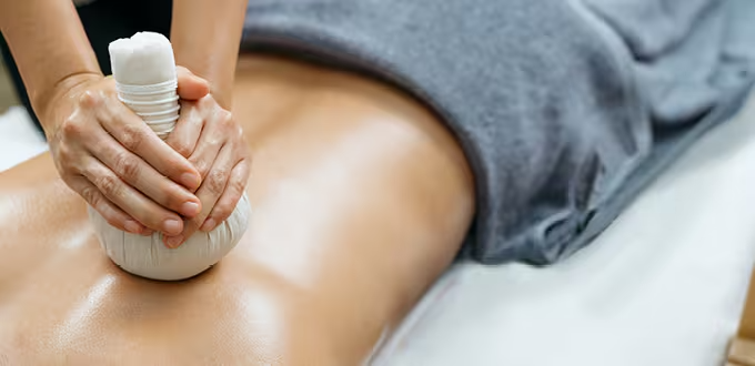 Thai herbal poultice massage
